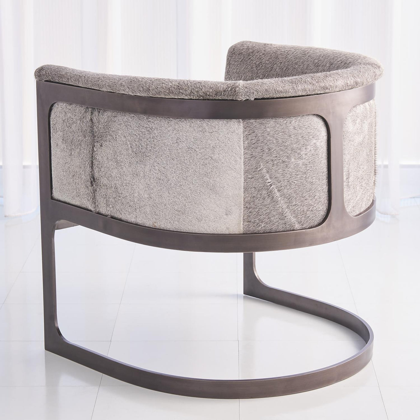 REGAN BARREL CHAIR - GREY HAIR-ON-HIDE-ANTIQUE GUNMETAL by Global Views